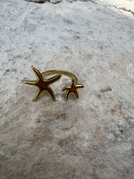 Anillo en Acero color dorado con estrellas