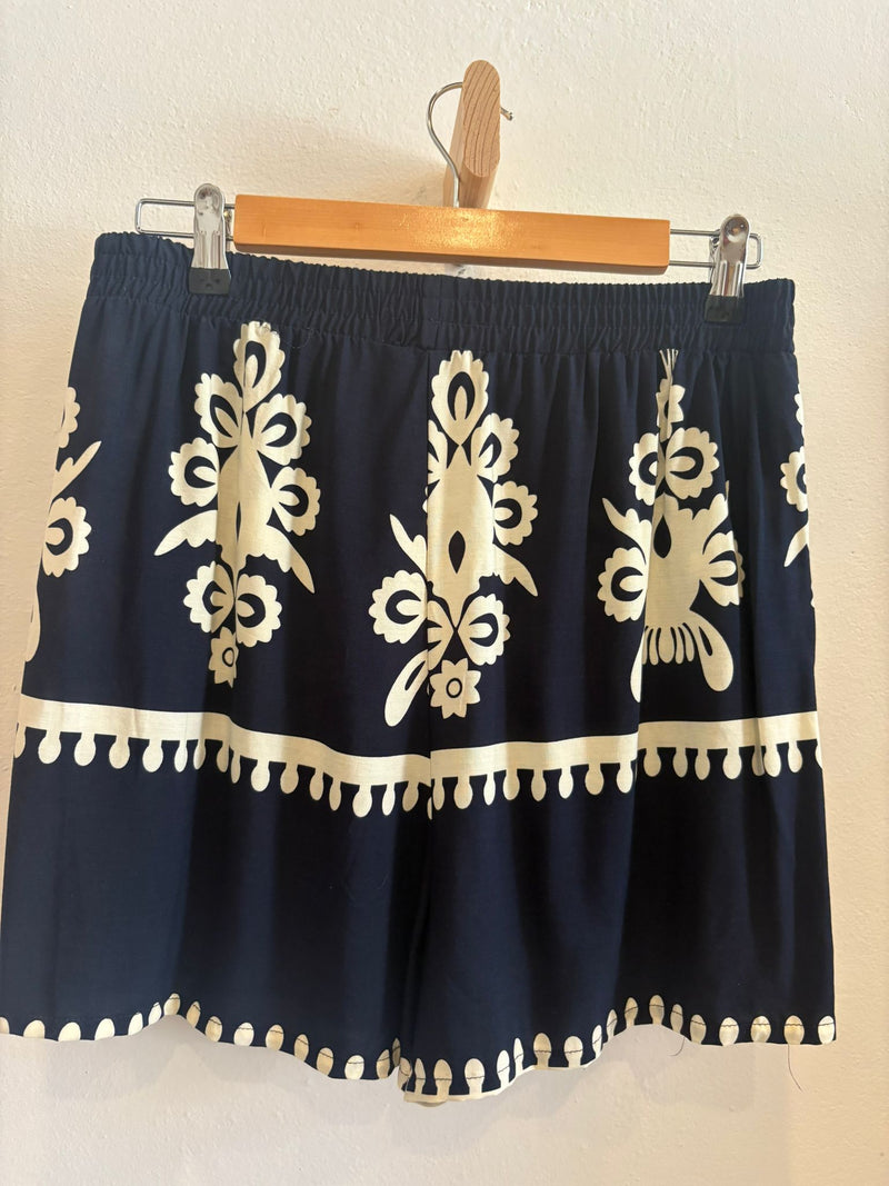 Pantalon corto