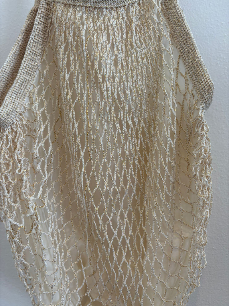 Bolso en tela forma de red en crema